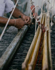 Silica Chalk Off White And Gray Stripes Pattern Soft Handwoven Merino Throw being handmade on weaving loom.