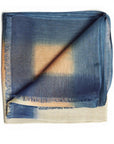 Mahogany Sky Brown Blue Ombre Linen Silk Handloom Scarf folded to display its soft textures and vibrant colors.