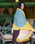 Cirq Sun Yellow Green Circle Pattern Hand Embroidered Linen Silk Handloom Scarf elegantly draped on a model.