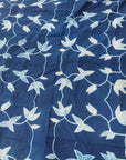 Folio Indigo Handcrafted Shibori Cotton Table Napkins ( set of 4 ) with intricate floral pattern in indigo and white.