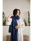 Model wearing Midnight Navy Blue Hand Woven Linen Silk Blend Scarf, showcasing its elegant drape and translucent appeal.