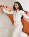 Canyon Hand Embroidered Hand Woven Merino Silk Soft Scarf draped elegantly over a model in a chic outfit.