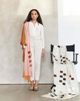 Canyon Hand Embroidered Hand Woven Merino Silk Soft Scarf displayed by a model, showcasing elegance and craftsmanship.