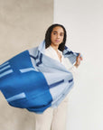Harbor Blue Silk Merino Hand Woven Hand Embroidered Modern Artisanal Scarf worn by a model in motion.