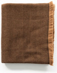 Hay Brown Twill Merino Handwoven Throw featuring a soft twill weave and a fringe edge, ideal for cozy interiors.