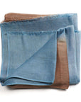Mahogany Sky Brown Blue Ombre Linen Silk Handloom Scarf showcasing a blend of soft brown and blue hues, handwoven in Nepal.