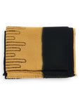 Handwoven Topaz Brown Myrtle Drift Merino Throw folded, featuring soft GOTS certified merino wool with contrasting designs.