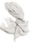 Pebble Light Gray Hand Woven Soft Linen Scarf elegantly styled on a white background with soft texture and fringed edges.