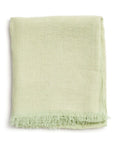 Soya Pastel Lime Green Hand Woven Soft Linen Scarf elegantly folded showcasing its soft texture and lime green color.