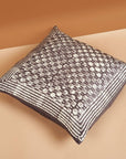 Oasis Charcoal Block Print Mulberry Silk Pillow Cover showcasing intricate block print design on a plush square pillow.