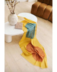 Cirq Sun Yellow Green Circle Pattern Hand Embroidered Linen Silk Handloom Scarf draped elegantly on a minimalist table.