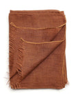 Oat Beige Neutral Hand Woven Soft Linen Silk Scarf elegantly displayed with a textured finish and fringed edges.
