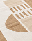 Dyoon Abstract Pattern Handwoven Artisanal Wool Rug showcasing intricate geometric patterns in earthy hues.