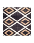 Tisa Indigo Hand Crafted Shibori Print Cotton Table Napkin set of 4 featuring a geometric diamond pattern in earthy tones.
