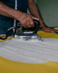 Cirq Sun Yellow Green Circle Pattern Hand Embroidered Linen Silk Handloom Scarf being ironed with a vintage iron.