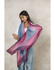 Iris Haze Blue Pink Cashmere Merino Handloom Scarf displayed by a model, showcasing its unique color blend.