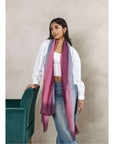 Iris Haze Blue Pink Cashmere Merino Handloom Scarf displayed by a model, showcasing its unique color blend and craftsmanship.