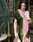 Iris Kiwi Green Pink Cashmere Merino Handwoven Scarf displayed on a woman, showcasing its unique colors and craftsmanship.