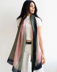 Iris Kiwi Green Pink Cashmere Merino Handwoven Scarf displayed by model, showcasing its unique colors and luxurious texture.