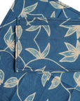 Folio Indigo Handcrafted Shibori Cotton Table Napkins ( set of 4 ) in a rich blue color with floral patterns.