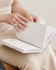 Person holding Oak Brown Zero Waste Handmade Artisanal Journal with handmade paper inside, capturing moments of inspiration.