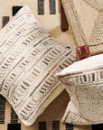 Dahli Brown Embroidered Artisanal Pillow Cover showcasing intricate embroidery on a textured fabric.
