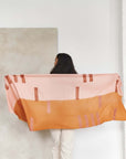 Canyon Hand Embroidered Hand Woven Merino Silk Soft Scarf in contemporary design, draped elegantly by a model.