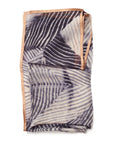 Samu Black hand crafted shibori print silk chiffon square scarf elegantly folded with modern design.