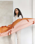 Canyon Hand Embroidered Hand Woven Merino Silk Soft Scarf displayed elegantly by a model in a minimalist setting.