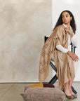 Model draped in the Maple Beige Handwoven Hand Embroidered Classic Scarf, showcasing its delicate design and elegance.