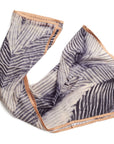 Samu Black hand crafted shibori print silk chiffon square scarf with a modern and elegant design.