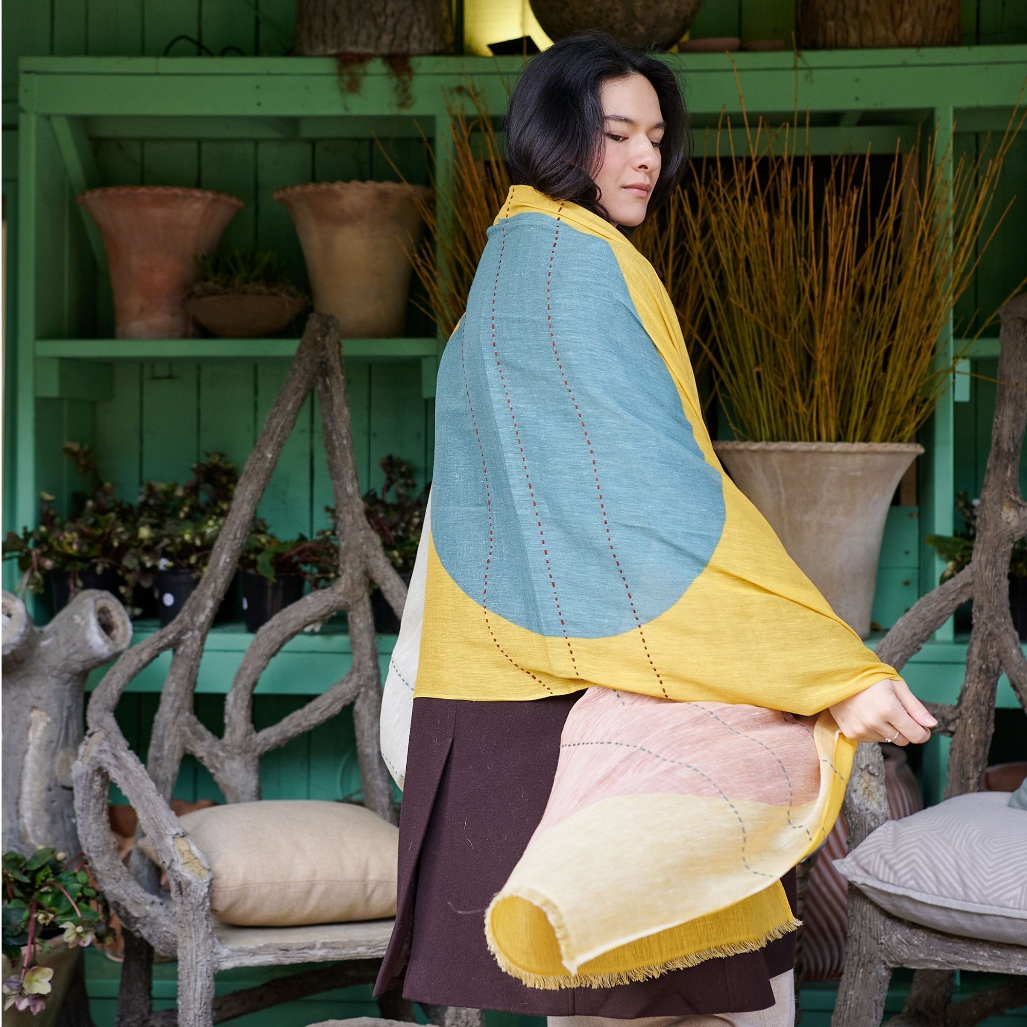 Cirq Sun Yellow Green Circle Pattern Hand Embroidered Linen Silk Handloom Scarf elegantly draped on a model.