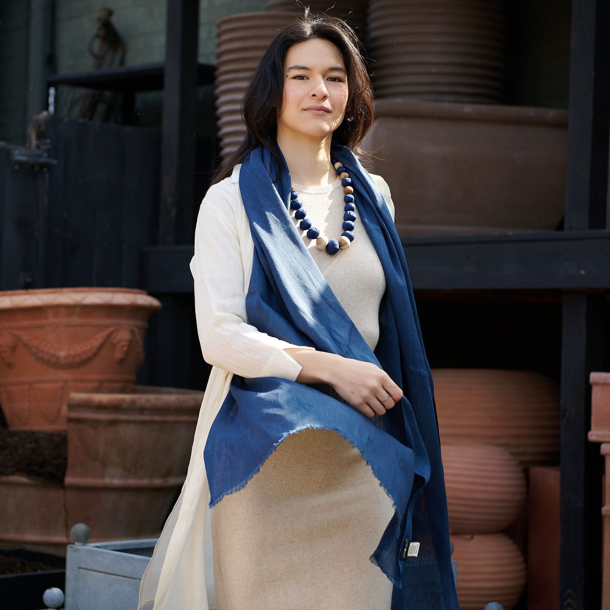 Dark Midnight Navy Solid Scarf Worn By A Model styled with an indigo silk beaded jewelry