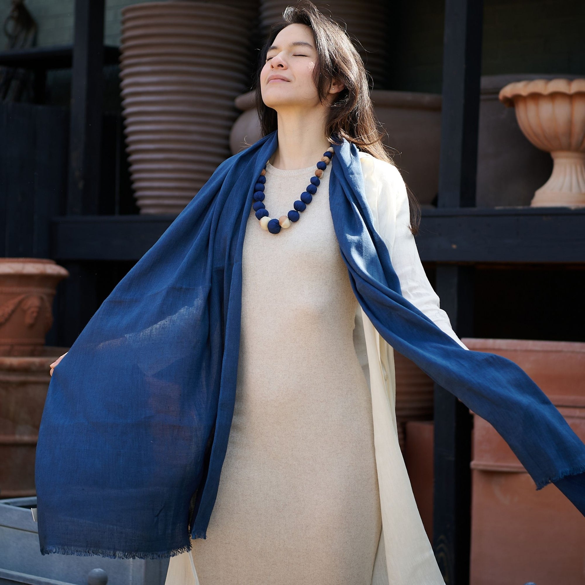Dark Midnight Navy Solid Scarf Worn By A Model styled with an indigo silk beaded jewelry