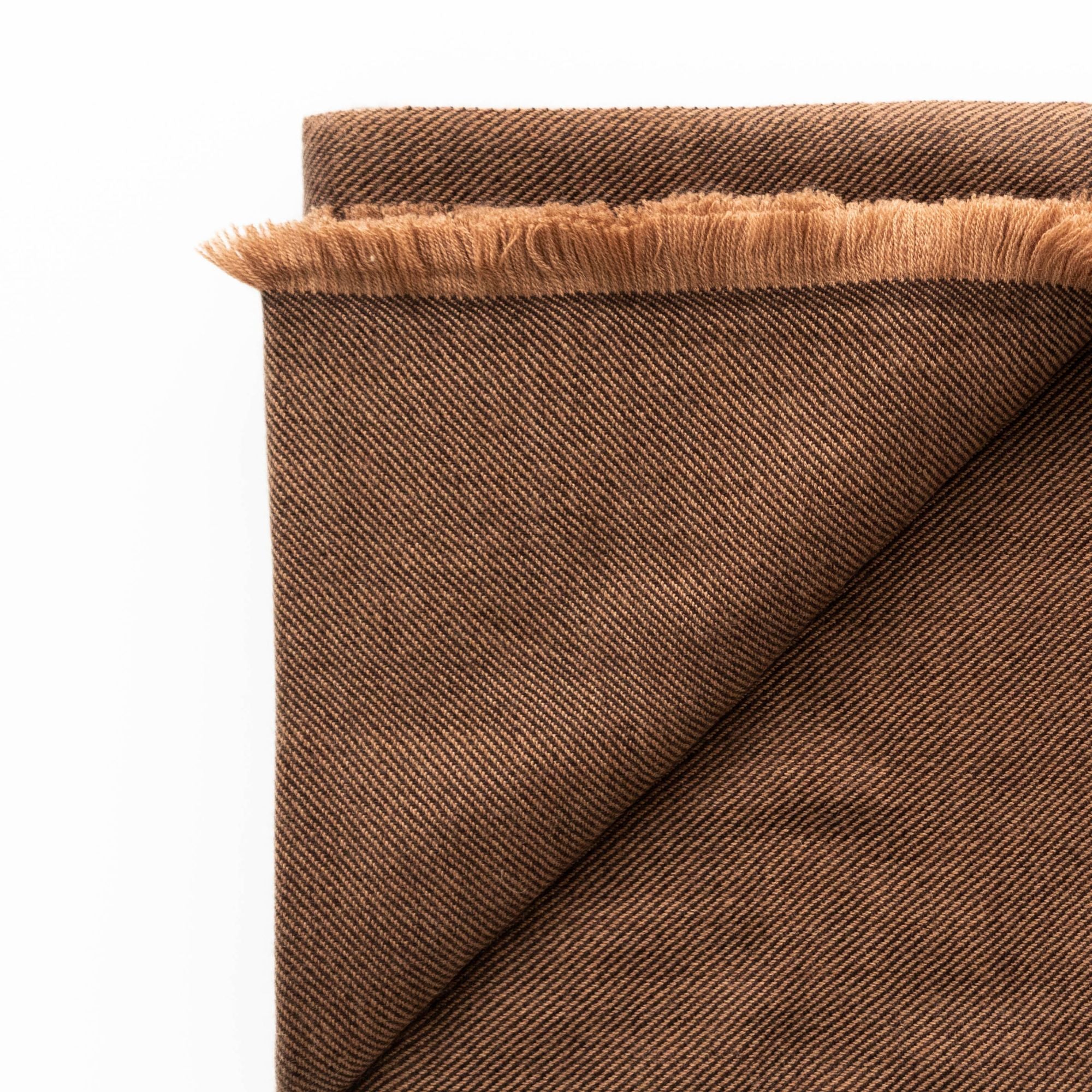 Hay Brown Twill Merino Handwoven Throw showcasing its soft twill weave and fringe detail.