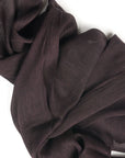 Resin Dark Brown Hand Woven Soft Linen Silk Scarf draped elegantly on a white background, showcasing its translucent appeal.