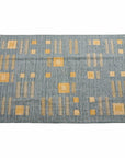 Ash Blue Gray Jute Handwoven Geometric Pattern Rug with yellow accents and intricate design.
