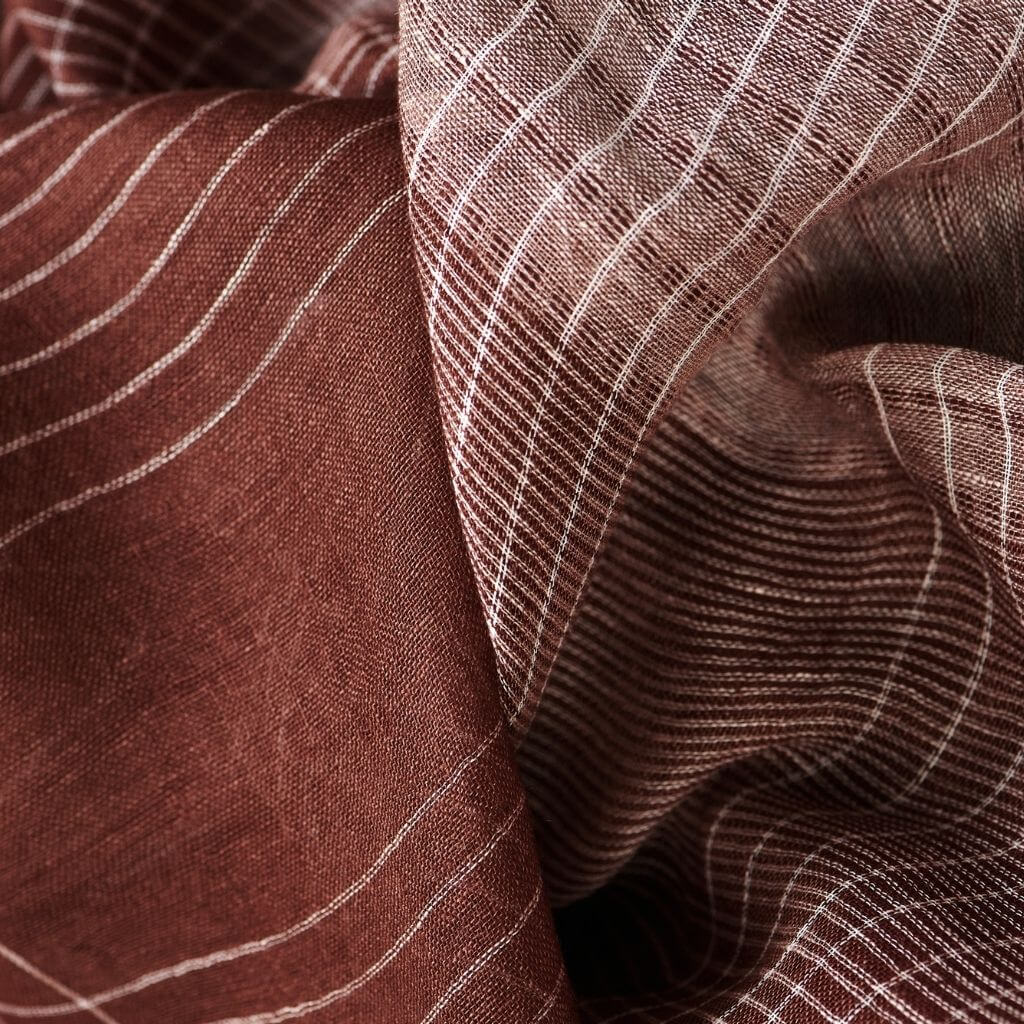 Auro Cinnabar Handwoven Earthy Rust Maroon Linen Scarf displaying rich earthy tones and delicate texture in elegant patterns.