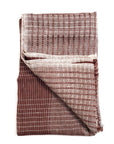 Auro Cinnabar Handwoven Earthy Rust Maroon Linen Scarf showcasing handwoven texture and unique pattern.
