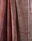Auro Cinnabar Handwoven Earthy Rust Maroon Linen Scarf showcasing natural texture and unique pattern.