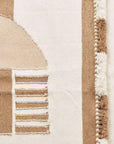 Dyoon Abstract Pattern Handwoven Artisanal Wool Rug showcasing earthy tones and unique geometric designs.