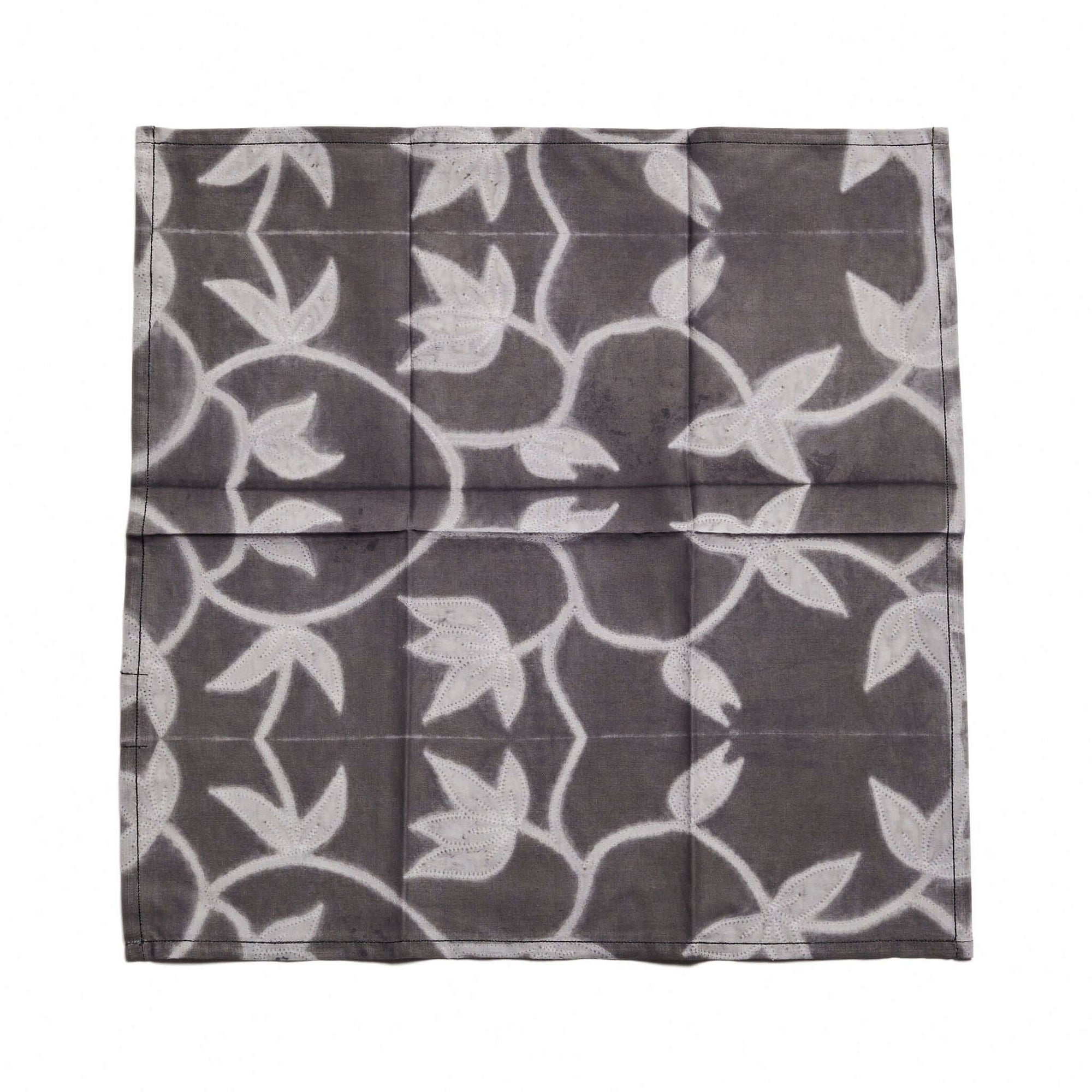 Folio Black Handcrafted Shibori Print Cotton Table Napkins ( set of 4 ) showcasing elegant floral patterns.