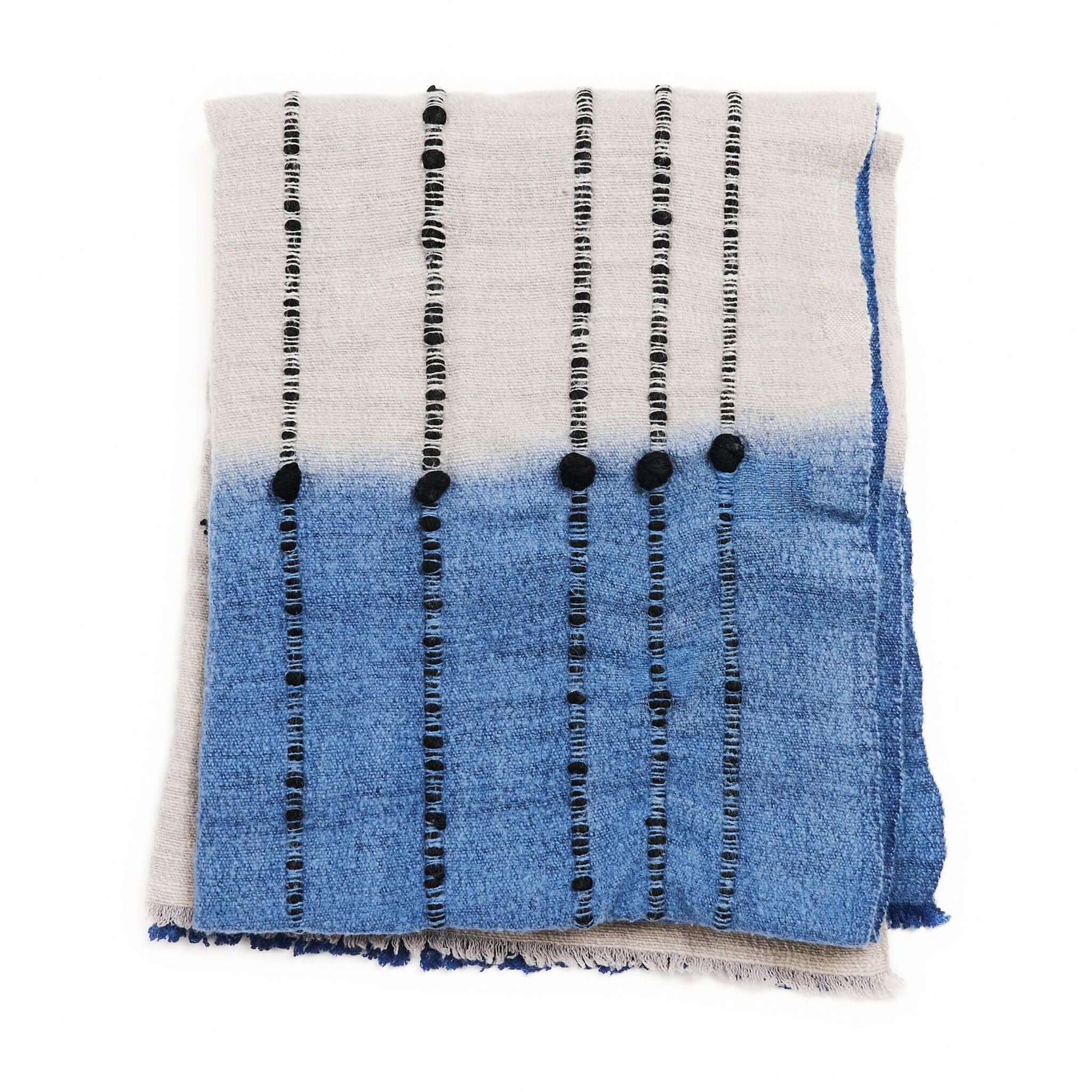 Hand Knotted Merino Textured Mari Throw Blanket in Blue Gray with serene colors and tactile textures.