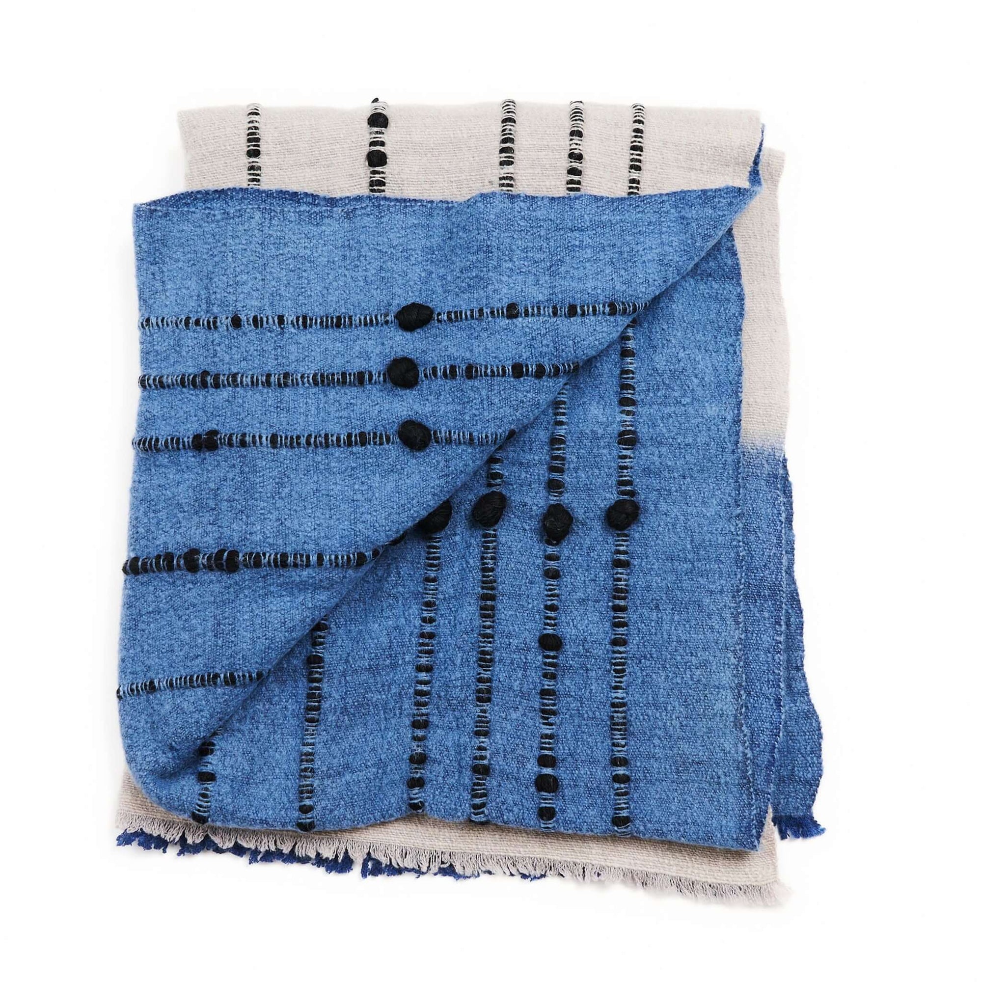 Hand Knotted Merino Textured Mari Throw Blanket in Blue Gray, showcasing serene hues and tactile texture.