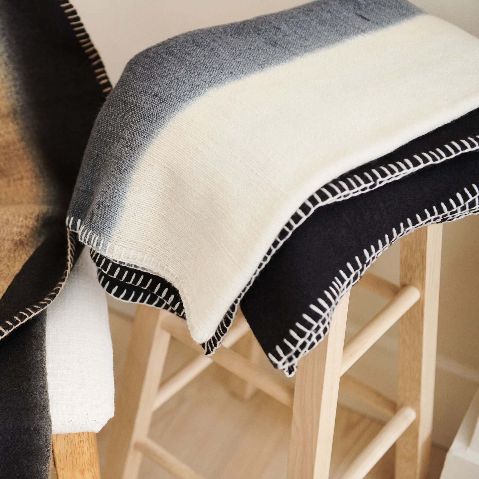 Ink Black White Ombre Textured Throw  In Hand Spun Merino And Hand Stitched Hem showcasing handwoven texture.