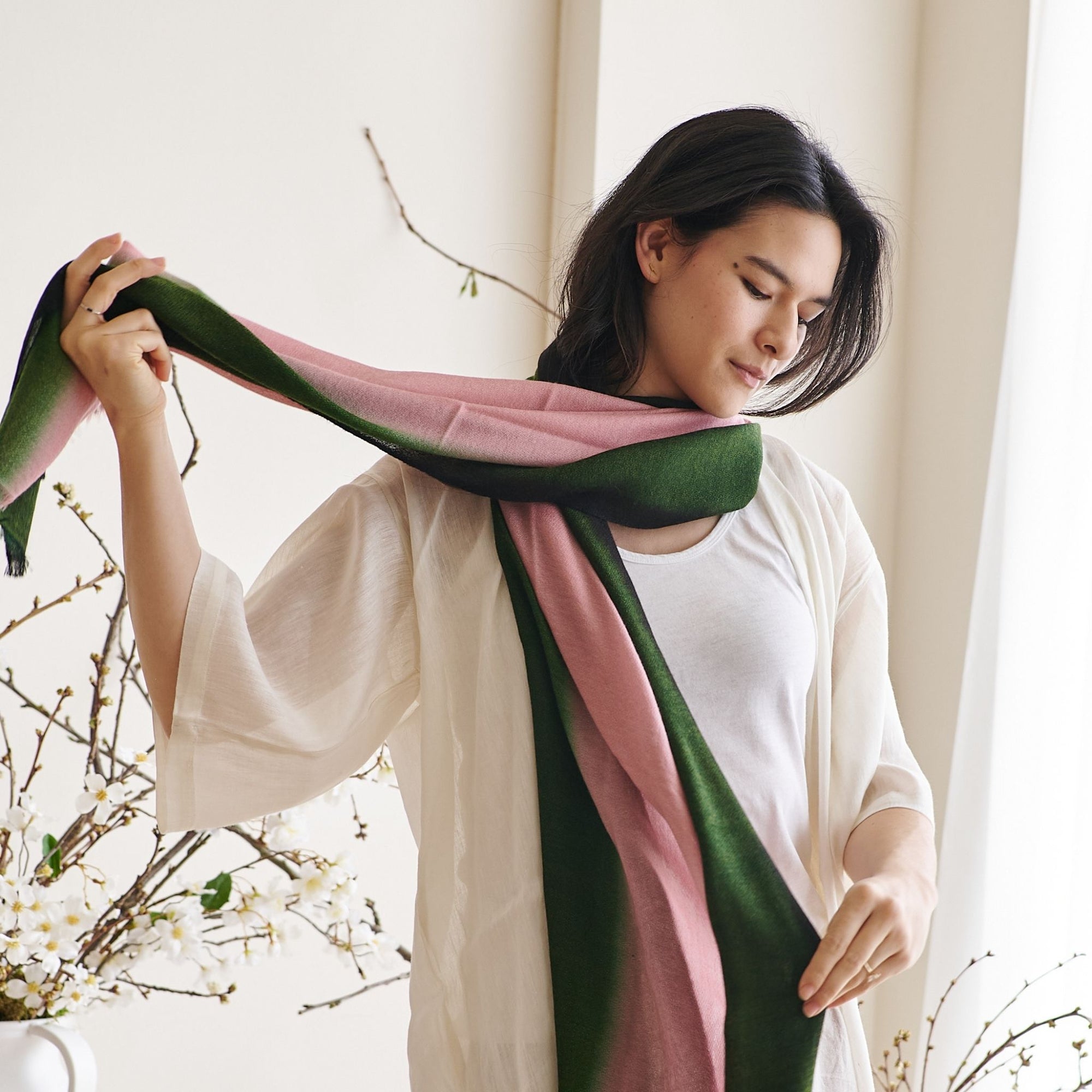 Iris Kiwi Green Pink Cashmere Merino Handwoven Scarf draped elegantly, showcasing vibrant colors and luxurious texture.