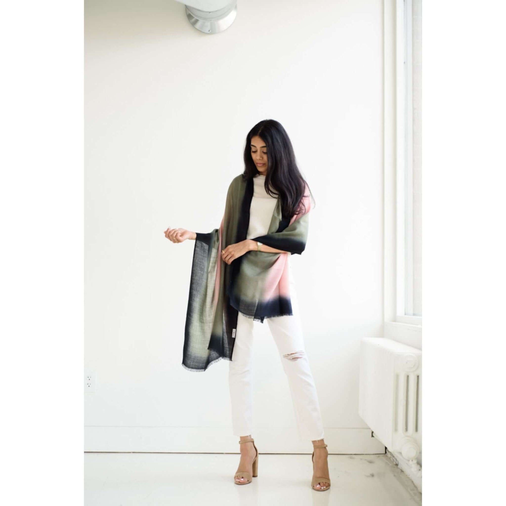 Iris Kiwi Green Pink Cashmere Merino Handwoven Scarf showcased by model in light-filled space.