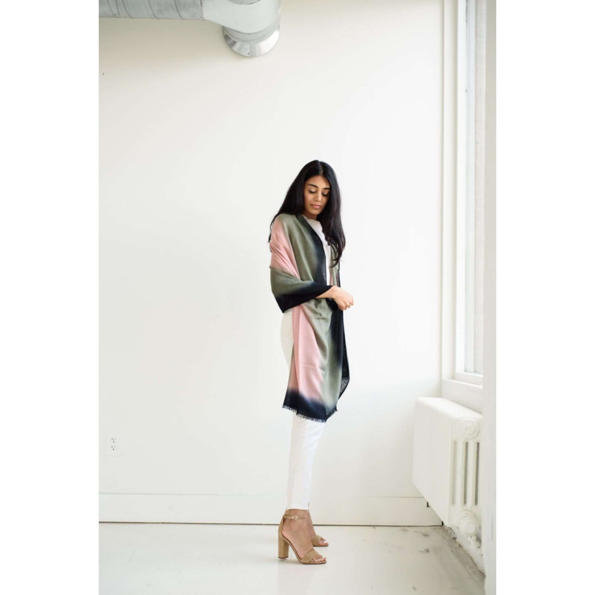 Iris Kiwi Green Pink Cashmere Merino Handwoven Scarf displayed elegantly by a model in a stylish setting.