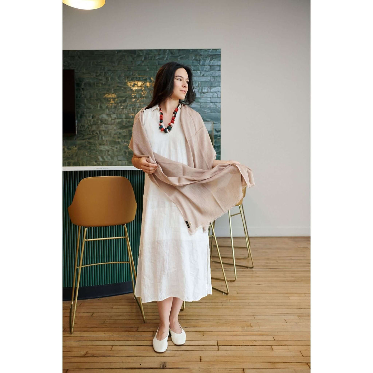 Jute Golden Brown Hand Woven Soft Linen Silk Scarf showcased by a model in a stylish outfit.