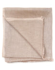Jute Golden Brown Hand Woven Soft Linen Silk Scarf elegantly folded showcasing its translucent appeal and soft texture.